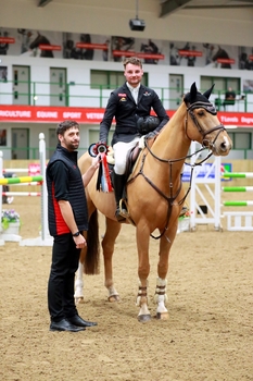 Ronnie Lee Jones claims victory in the SEIB Winter Novice qualifier at Hartpury University with catch-ride Iron Bru